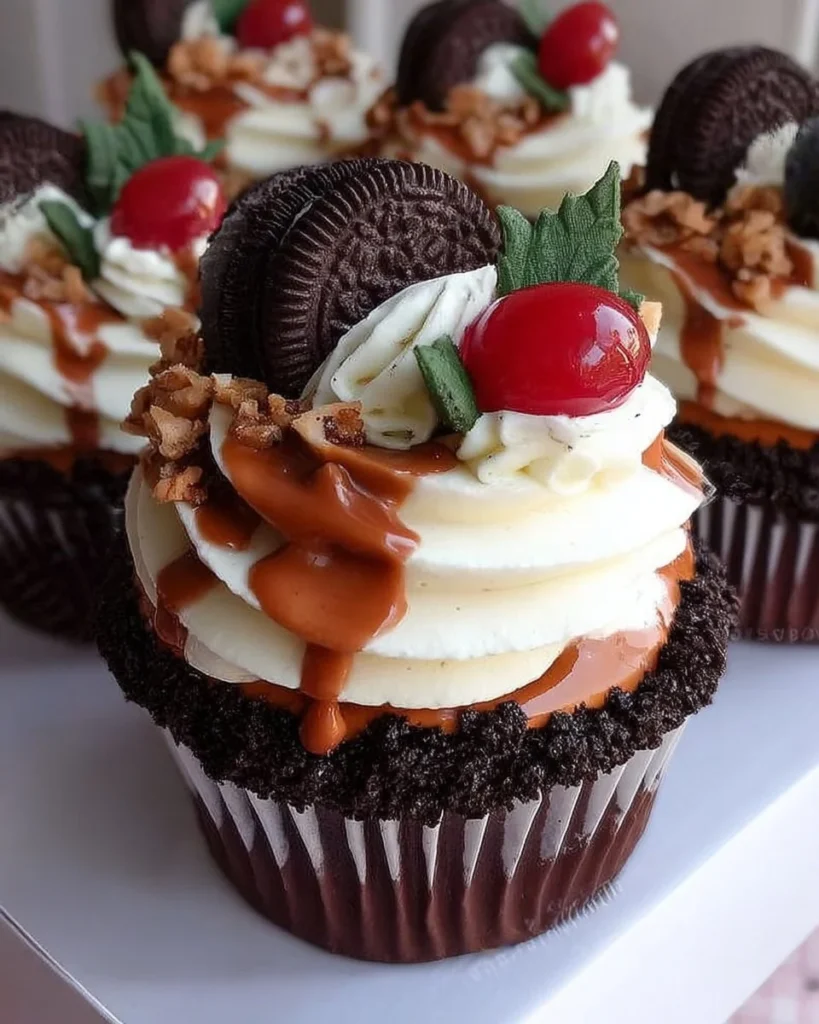Various colorful cupcakes arranged on a decorative platter