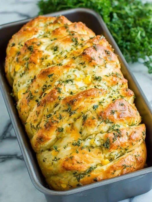 Rustic no-knead rosemary garlic bread fresh out of the oven